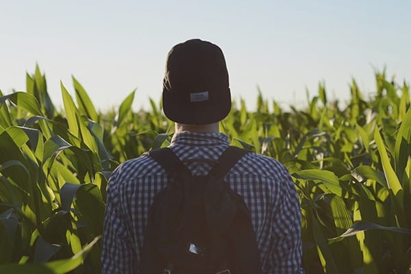 Spern donor walking into a field