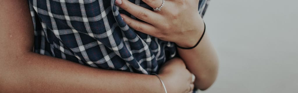 A woman hugging her boyfriend