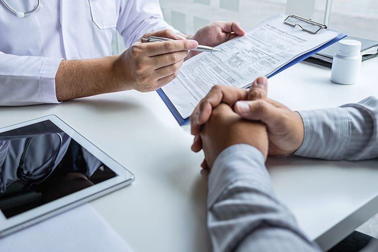 A fertility doctor explaining the option of using donor sperm for fertility treatment