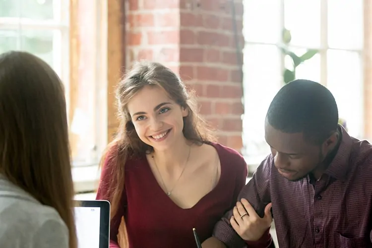 A couple talking to a potential surrogate