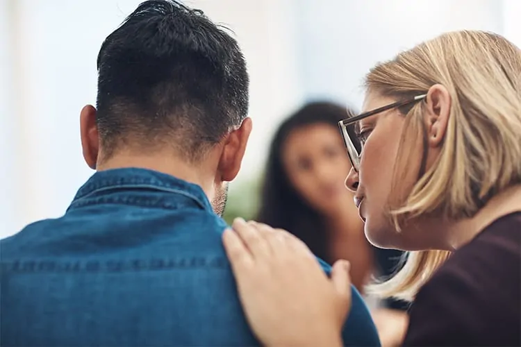 A man with klinefelter syndrome being comforted