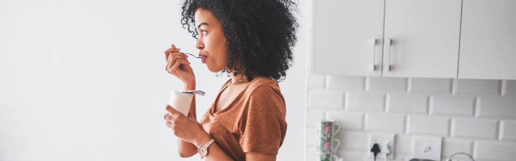 A_woman_eating_yoghurt
