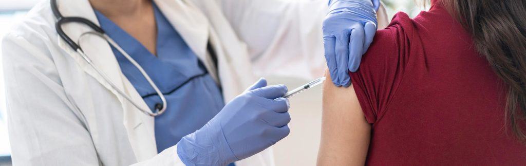 Woman_getting_Covid19_Vaccine